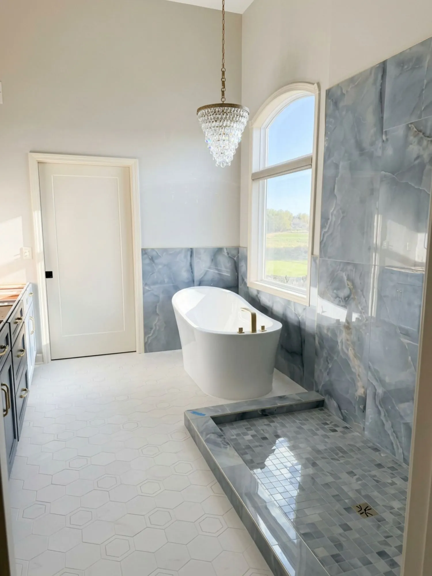 Custom bathroom vanity and lighting in a Kansas City home renovation