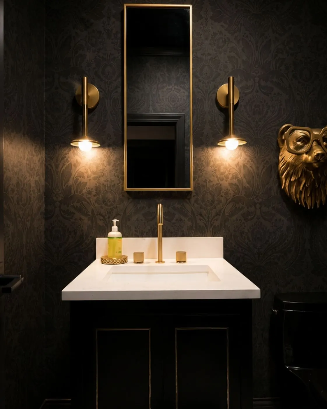 Powder room remodel with statement wallpaper and brass fixtures in Olathe, KS